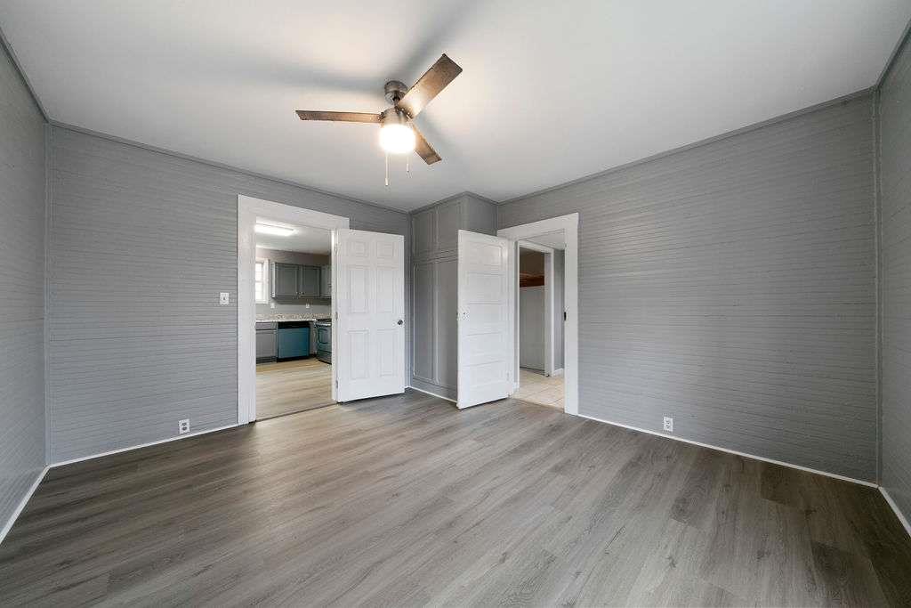 425 North Marble Street Rockmart, GA 30153 - Photo 15 of 26 wooden floor in an empty room with a window