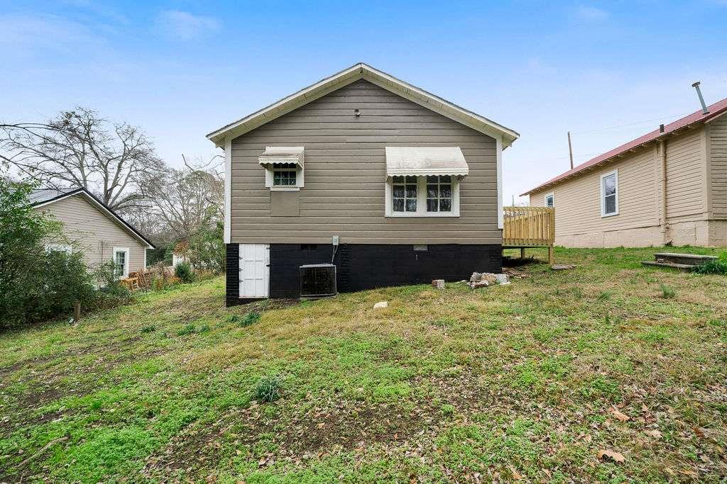 425 North Marble Street Rockmart, GA 30153 - Photo 23 of 26 a front view of a house with garden