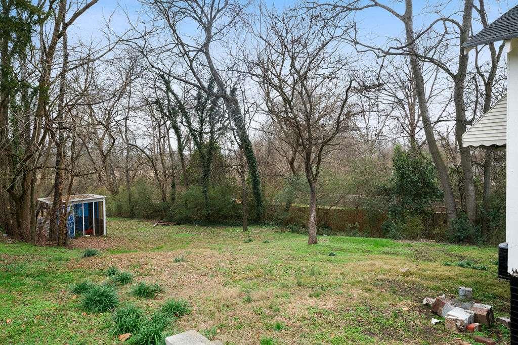 425 North Marble Street Rockmart, GA 30153 - Photo 24 of 26 a view of a backyard with large trees