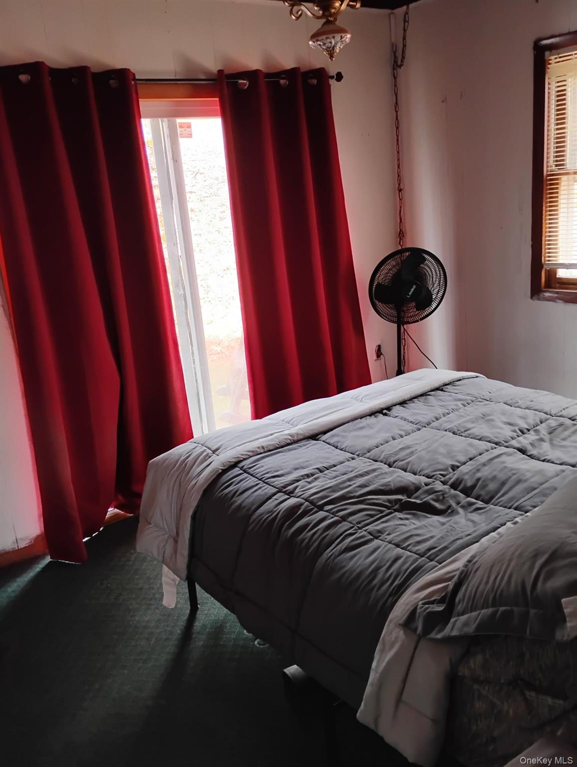 120 Swallow Court Bushkill, PA 18324 - Photo 21 of 39 a bedroom with a bed and a window