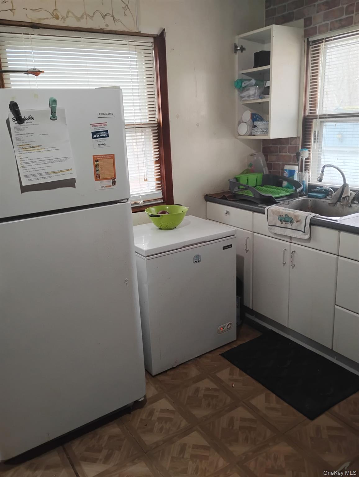 120 Swallow Court Bushkill, PA 18324 - Photo 26 of 39 a utility room with sink dryer and washer