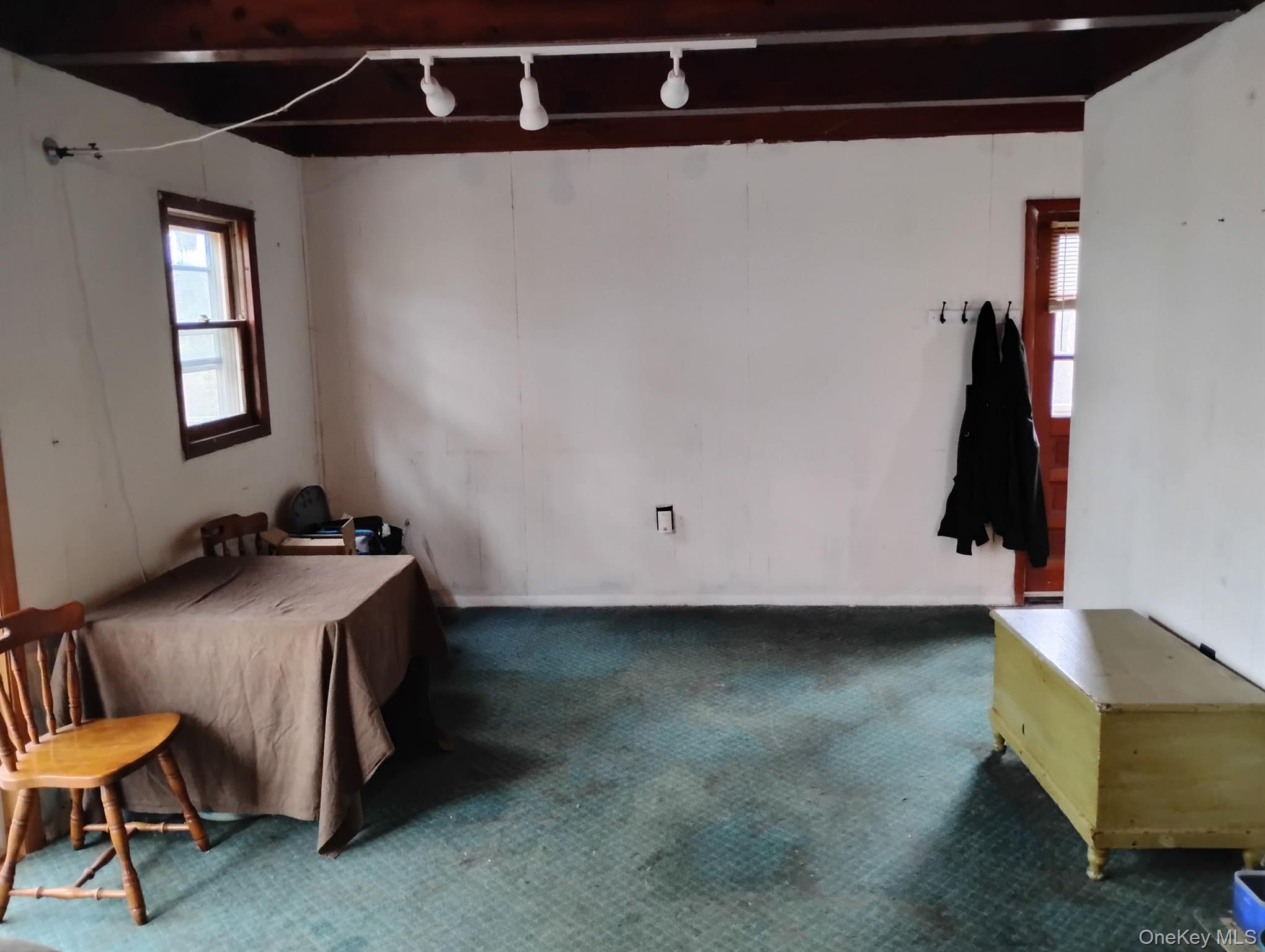 120 Swallow Court Bushkill, PA 18324 - Photo 27 of 39 a room with a chair and white walls