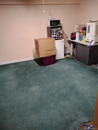 a view of a storage & utility room with washer and dryer