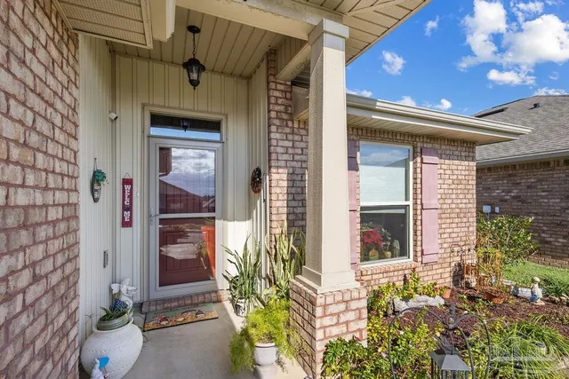 a front view of a house with a porch