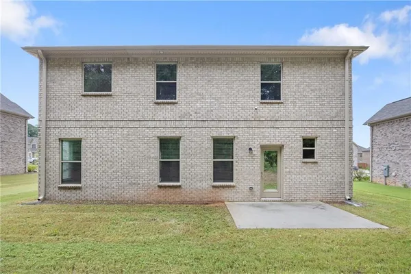a front view of house with yard