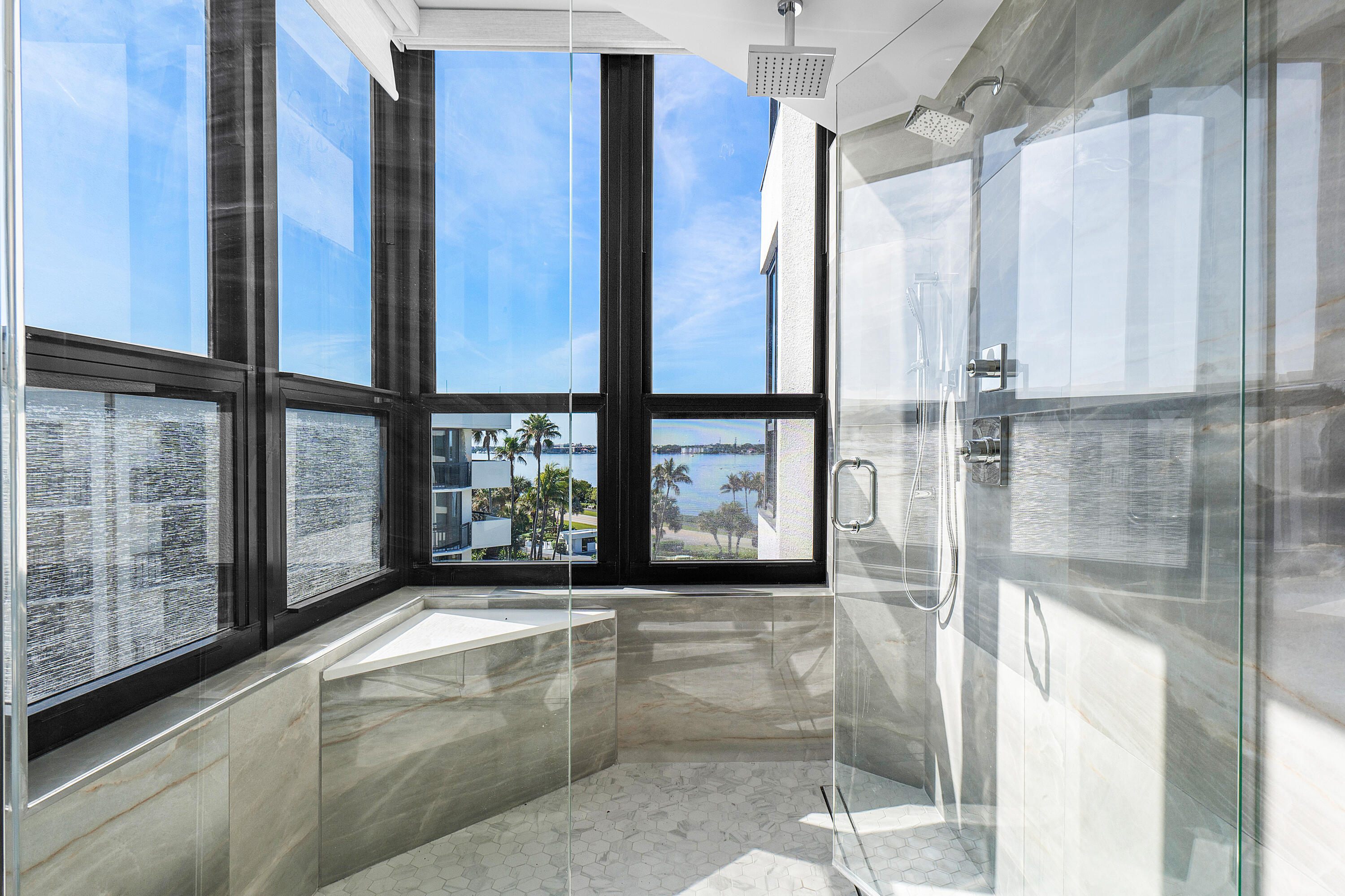 3120 South Ocean Boulevard, Unit 1502 Palm Beach, FL 33480 - Photo 16 of 26 a view of a bathroom with a tub and window