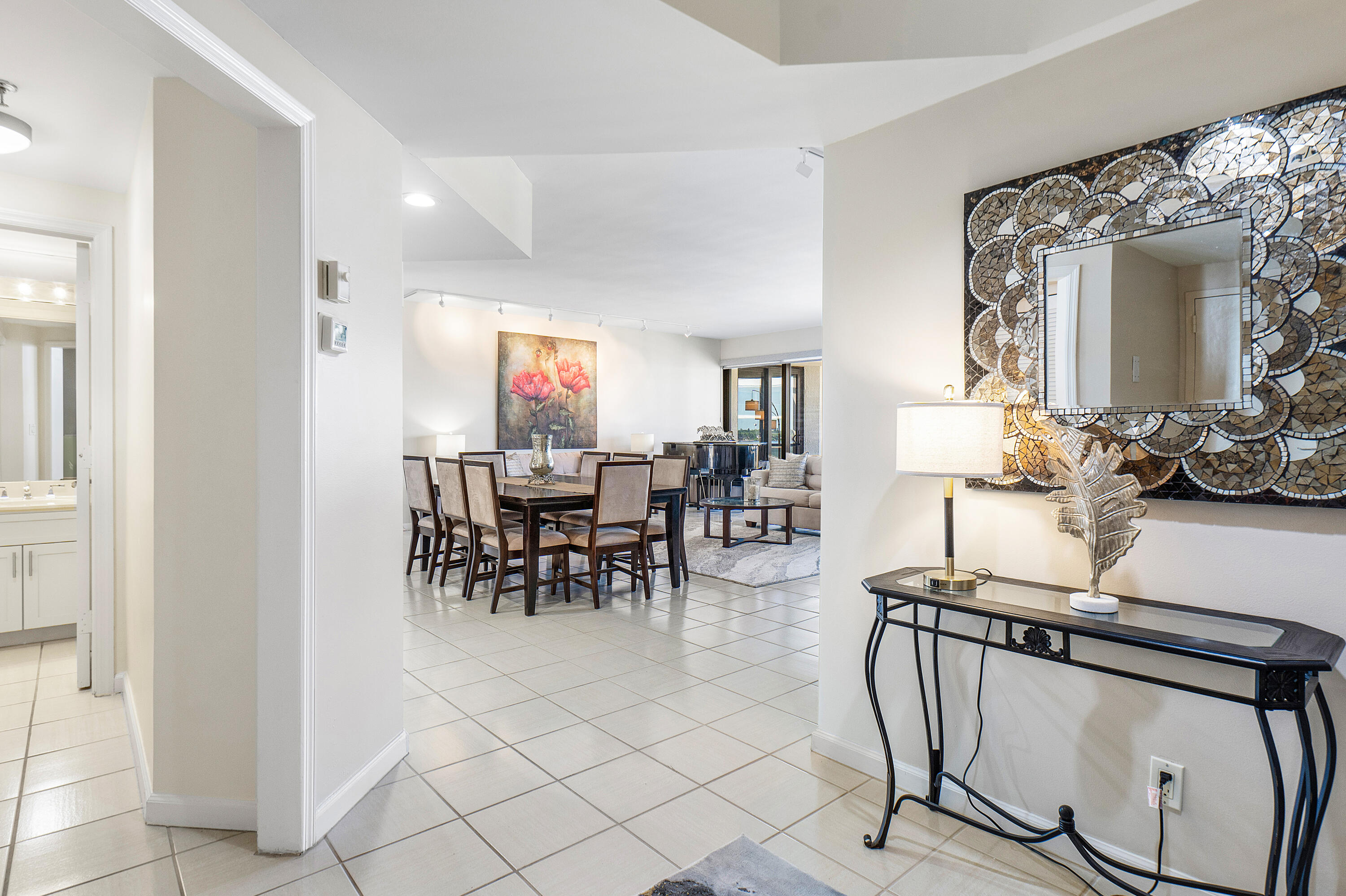 3120 South Ocean Boulevard, Unit 1502 Palm Beach, FL 33480 - Photo 2 of 26 a view of a dining room with furniture