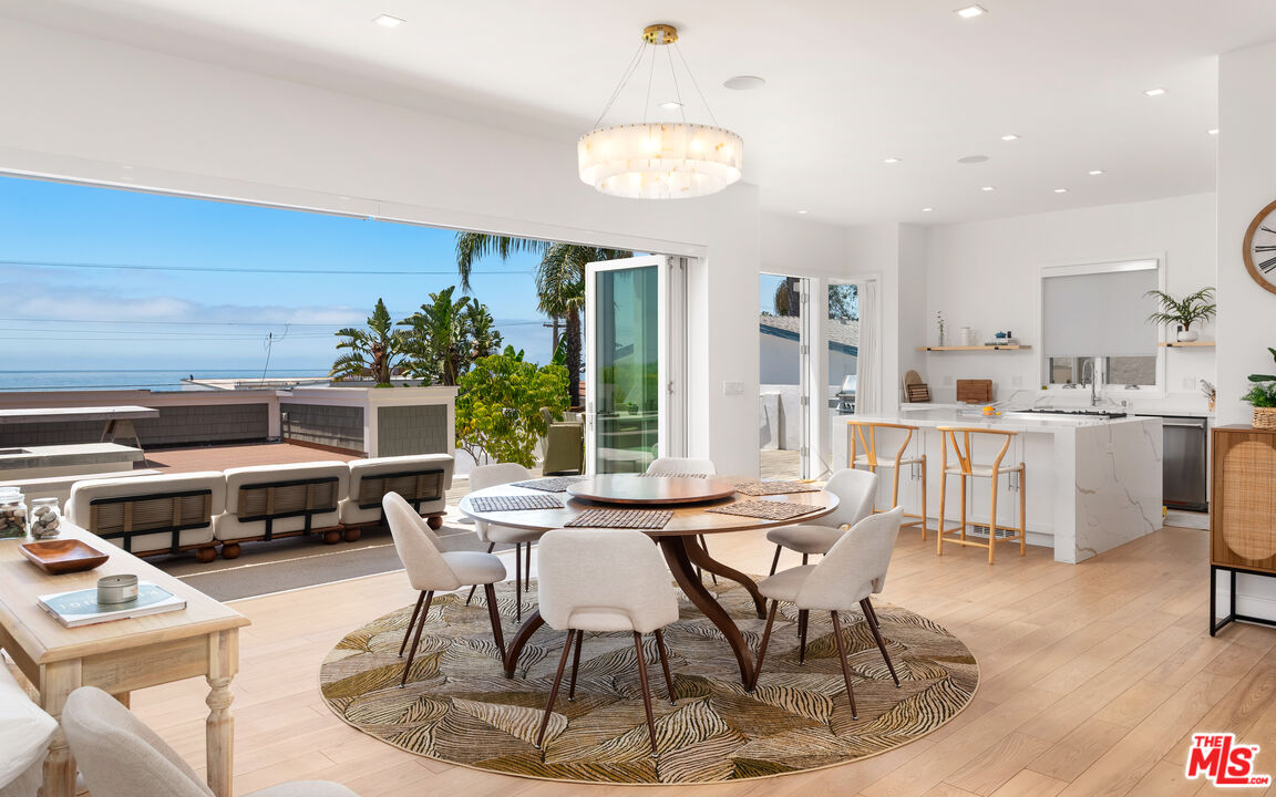 25157 Malibu Road Malibu, CA 90265 - Photo 7 of 33 a dining room with furniture and window
