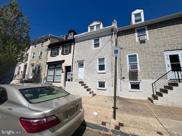 4401 Baker Street Philadelphia, PA 19127 - Photo 3 of 8 a front view of a house with parking area