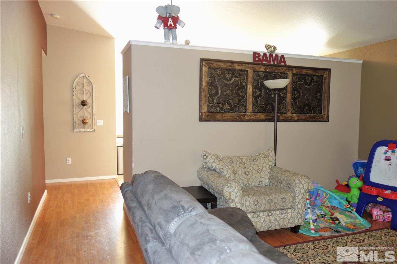 18470 Datewood Court Reno, NV 89508 - Photo 4 of 20 a living room with furniture and wooden floor