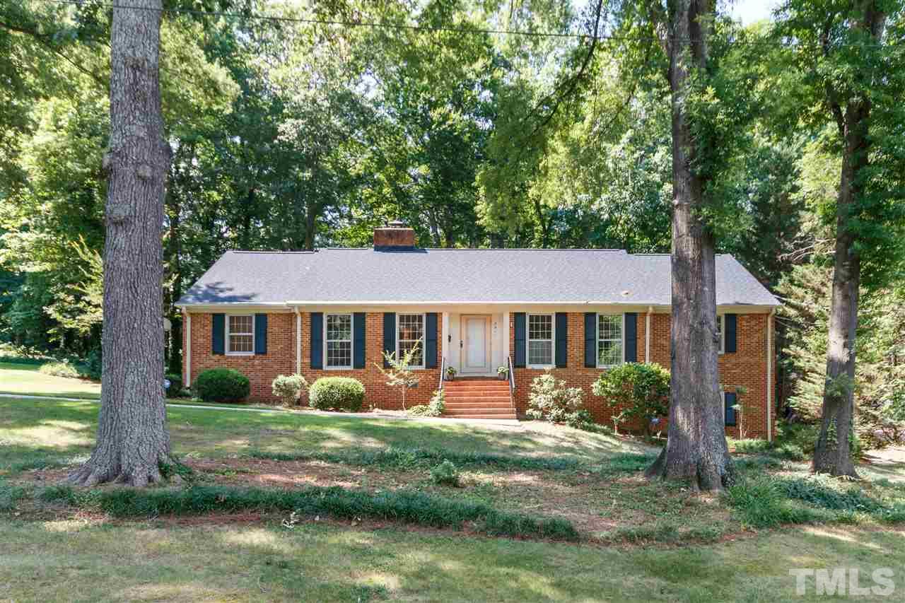 2911 Buckingham Road Durham, NC 27707 - Photo 1 of 25 a view of a house with yard and plants