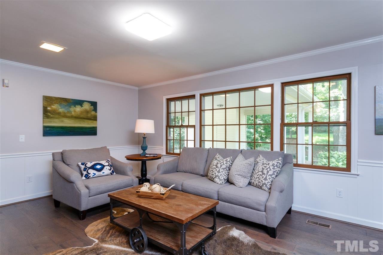 2911 Buckingham Road Durham, NC 27707 - Photo 12 of 25 a living room with furniture and a large window