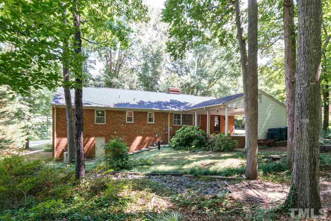 2911 Buckingham Road Durham, NC 27707 - Photo 24 of 25 a view of a house with backyard and garden