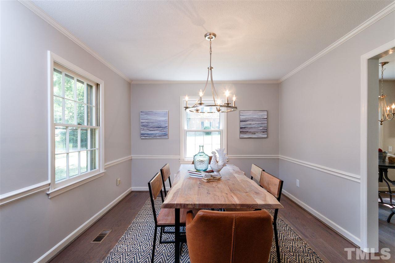 2911 Buckingham Road Durham, NC 27707 - Photo 6 of 25 a view of a dining room with furniture window and outside view
