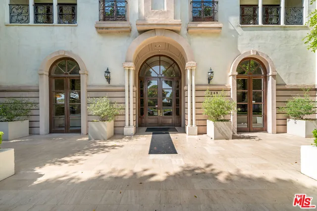 a view of entrance gate of a house