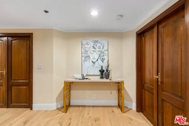 a view of room with window and hallway