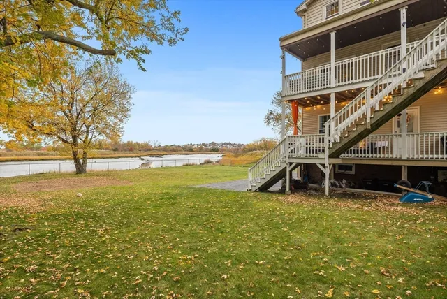 a view of an ocean with building in the background