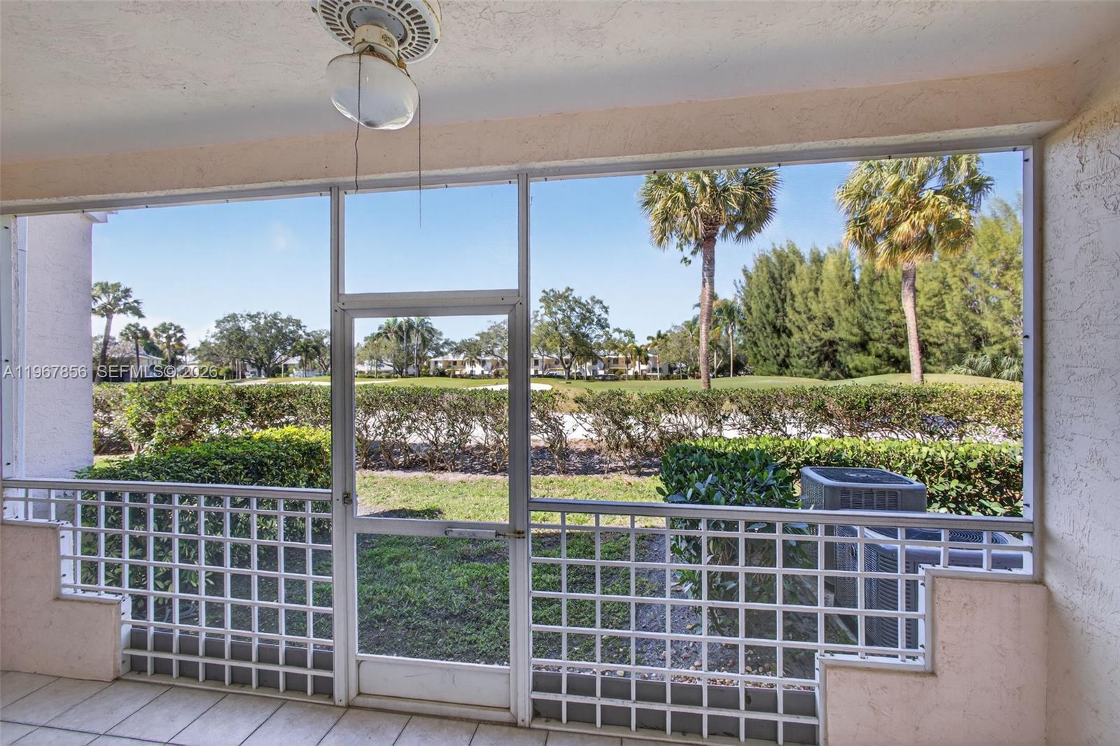101 Muirfield Court, Unit 101D Jupiter, FL 33458 - Photo 30 of 62 a view of a balcony and floor to ceiling window