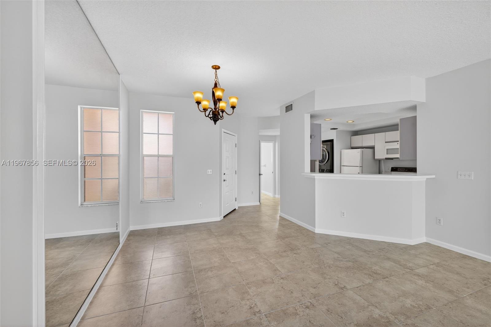 101 Muirfield Court, Unit 101D Jupiter, FL 33458 - Photo 3 of 62 a view of a storage & utility room with closet window