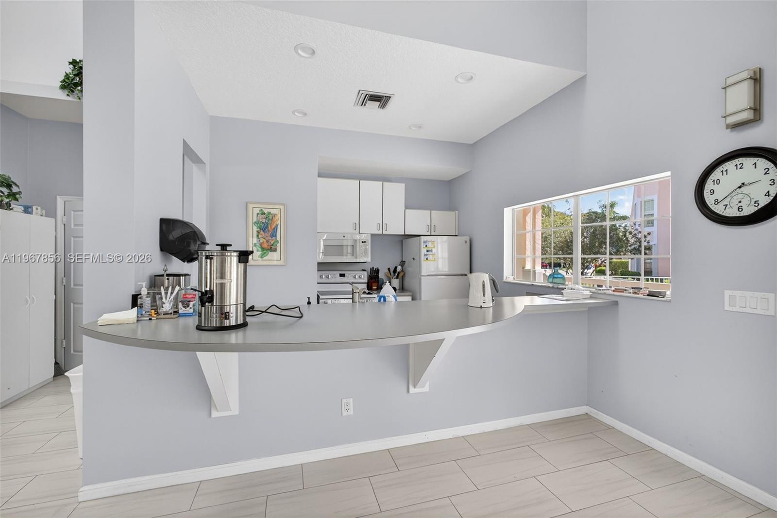 101 Muirfield Court, Unit 101D Jupiter, FL 33458 - Photo 39 of 62 a view of kitchen with sink and window