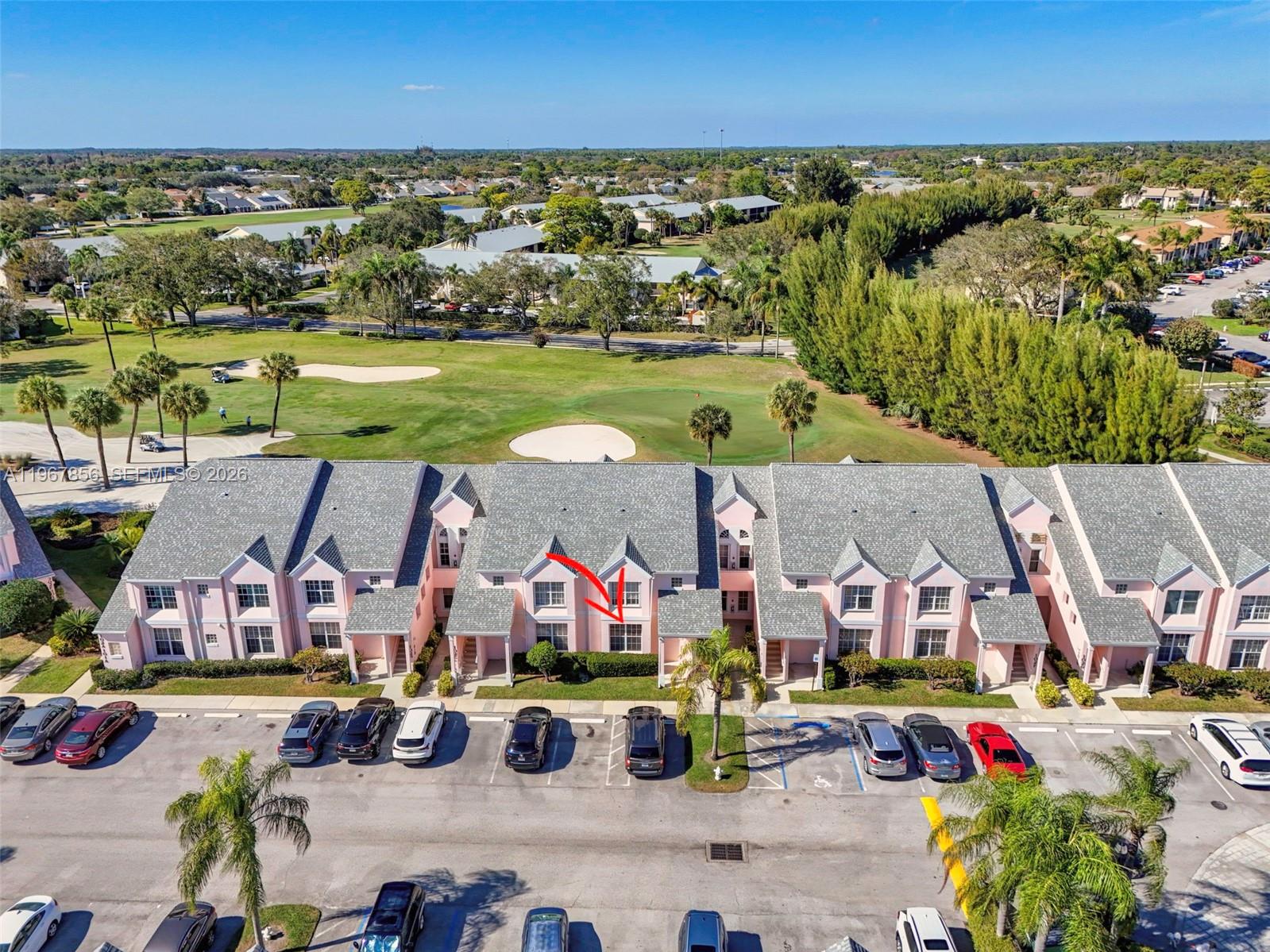 101 Muirfield Court, Unit 101D Jupiter, FL 33458 - Photo 46 of 62 an aerial view of residential houses with outdoor space and swimming pool