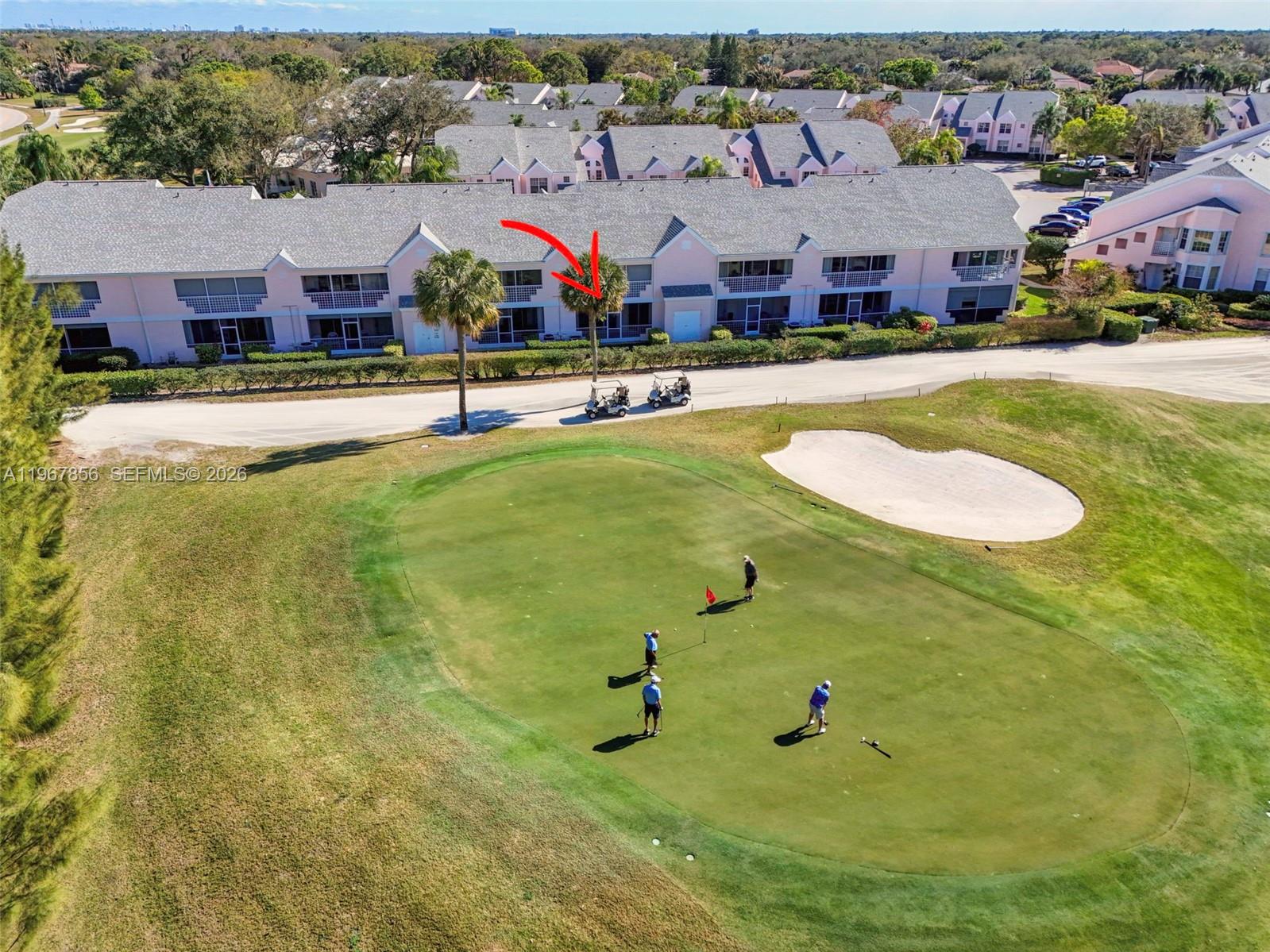 101 Muirfield Court, Unit 101D Jupiter, FL 33458 - Photo 57 of 62 an aerial view of residential houses with outdoor space