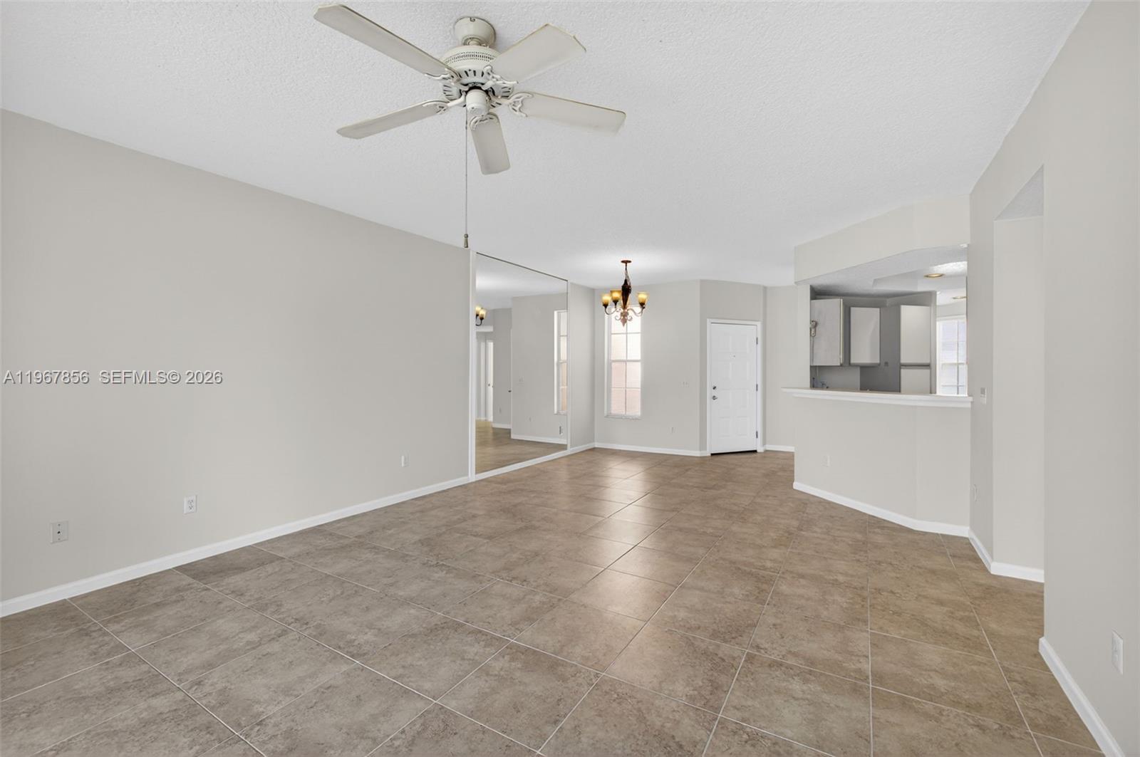 101 Muirfield Court, Unit 101D Jupiter, FL 33458 - Photo 9 of 62 a view of a ceiling fan in a room