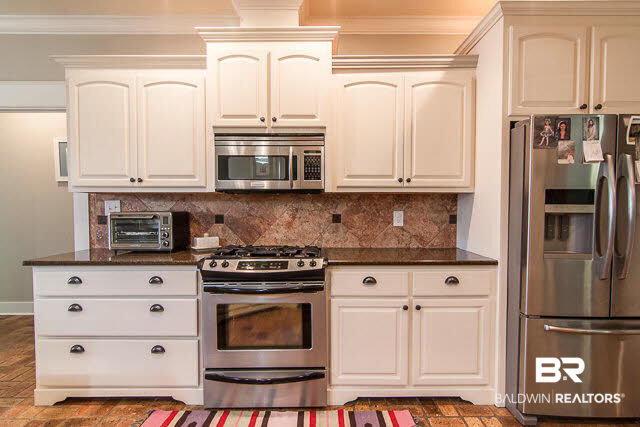 11099 Niblick Loop Fairhope, AL 36532 - Photo 13 of 33 gorgeous custome white cabinets; granite counters; gas cook top