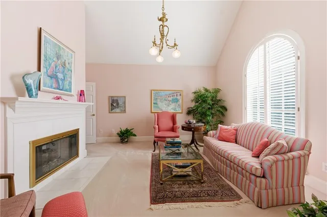 a living room with furniture or couch and a fireplace