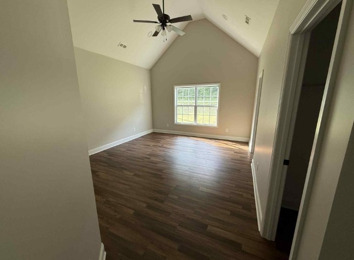 51 Bluff Creek Road Brush Creek, TN 38547 - Photo 14 of 23 a view of an empty room with wooden floor and a window