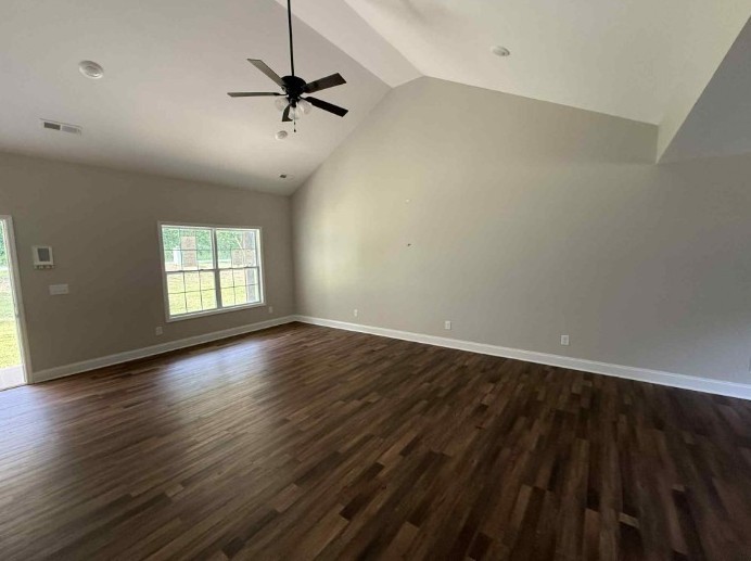 51 Bluff Creek Road Brush Creek, TN 38547 - Photo 16 of 23 wooden floor in an empty room with a window