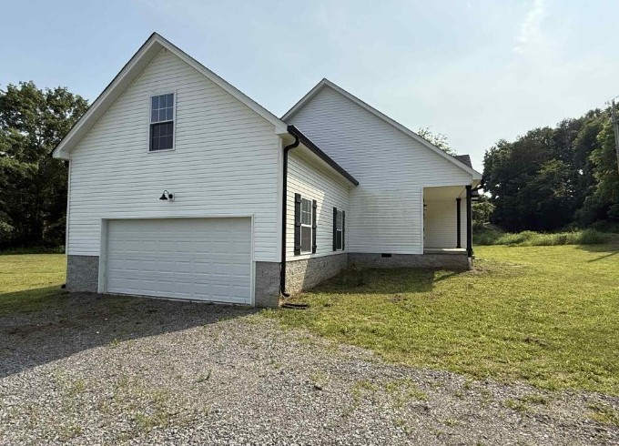 51 Bluff Creek Road Brush Creek, TN 38547 - Photo 4 of 23 a backyard of a house