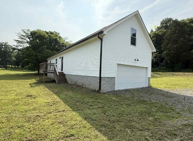 51 Bluff Creek Road Brush Creek, TN 38547 - Photo 5 of 23 a view of a backyard of the house