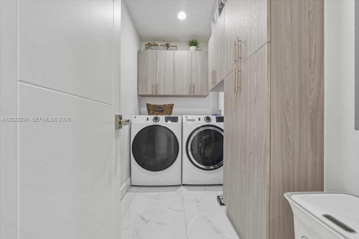 120 West 50th Street Hialeah, FL 33012 - Photo 11 of 22 a utility room with dryer and washer