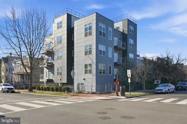 a view of a building and a street