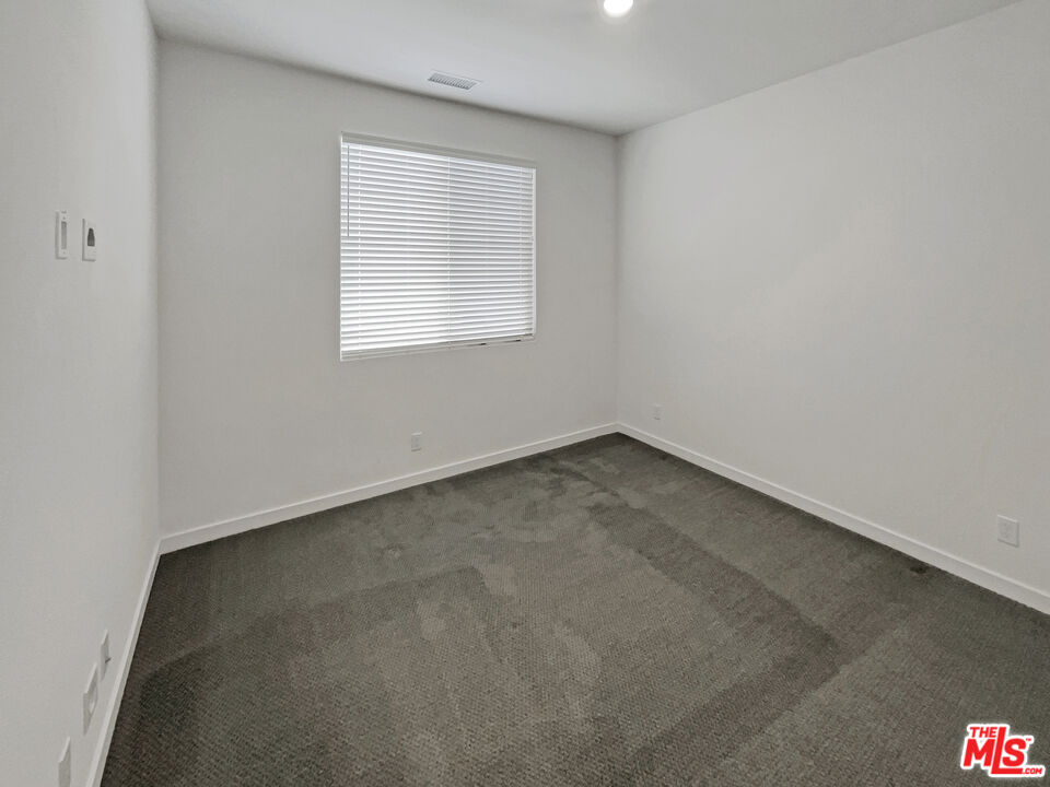 145 Stage Irvine, CA 92618 - Photo 12 of 20 an empty room with a window