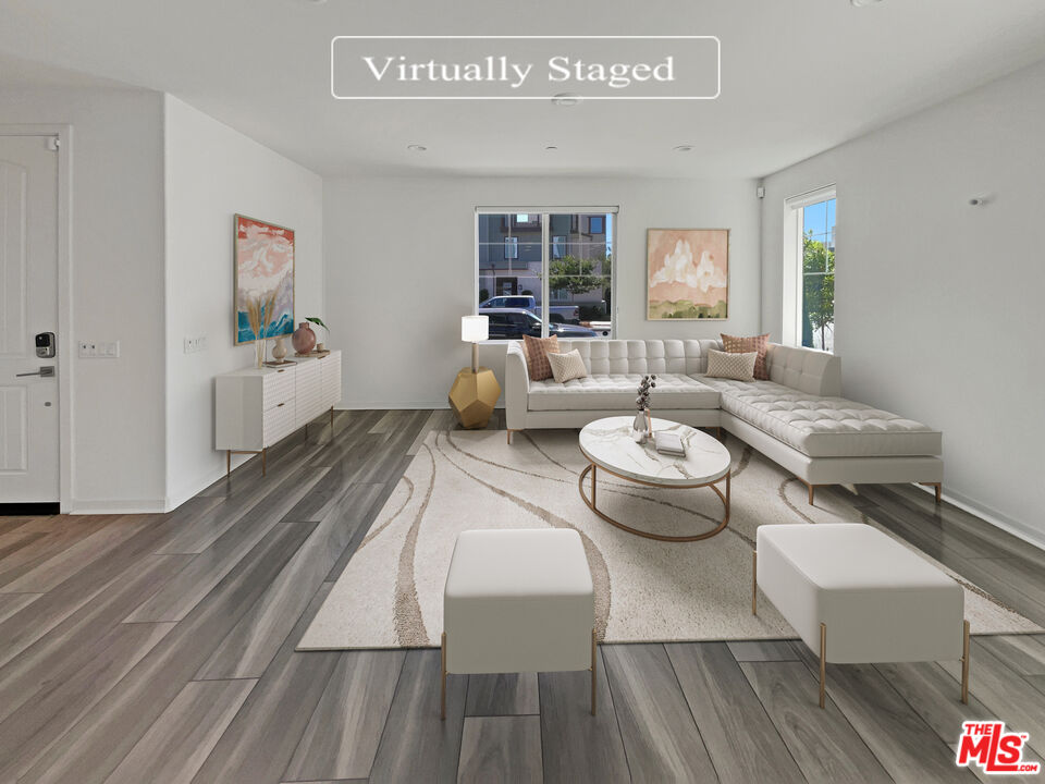 145 Stage Irvine, CA 92618 - Photo 2 of 20 a living room with furniture and wooden floor