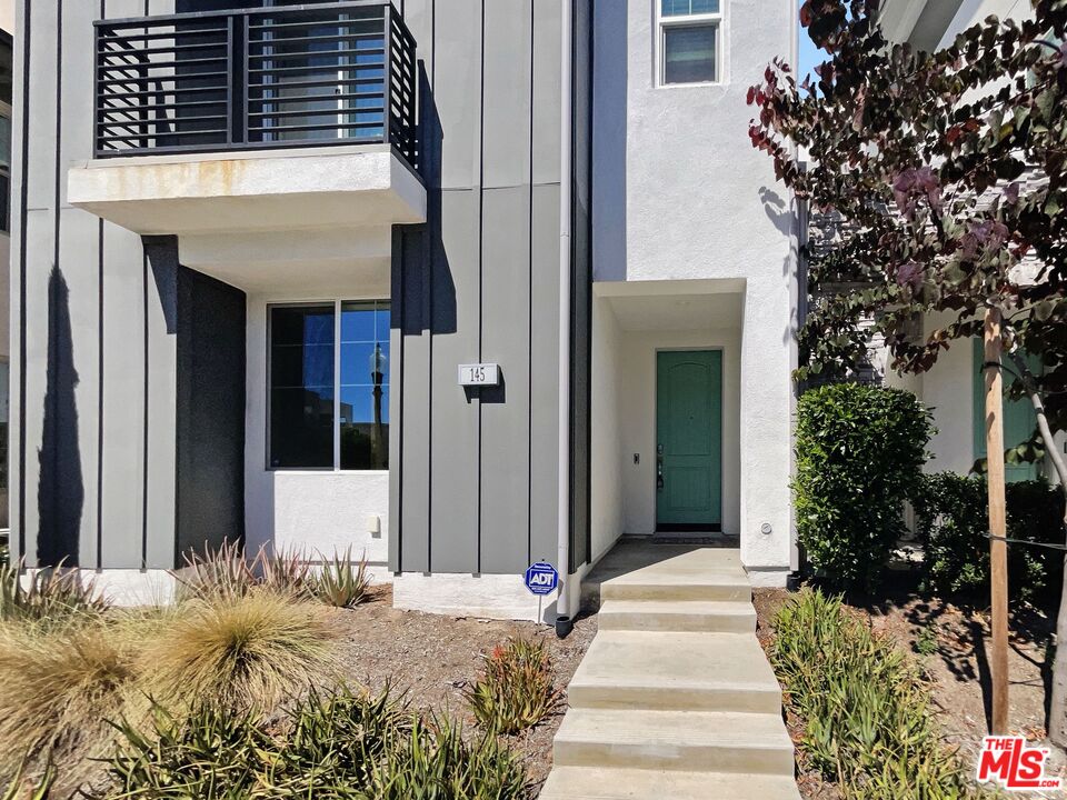 145 Stage Irvine, CA 92618 - Photo 7 of 20 a front view of a house