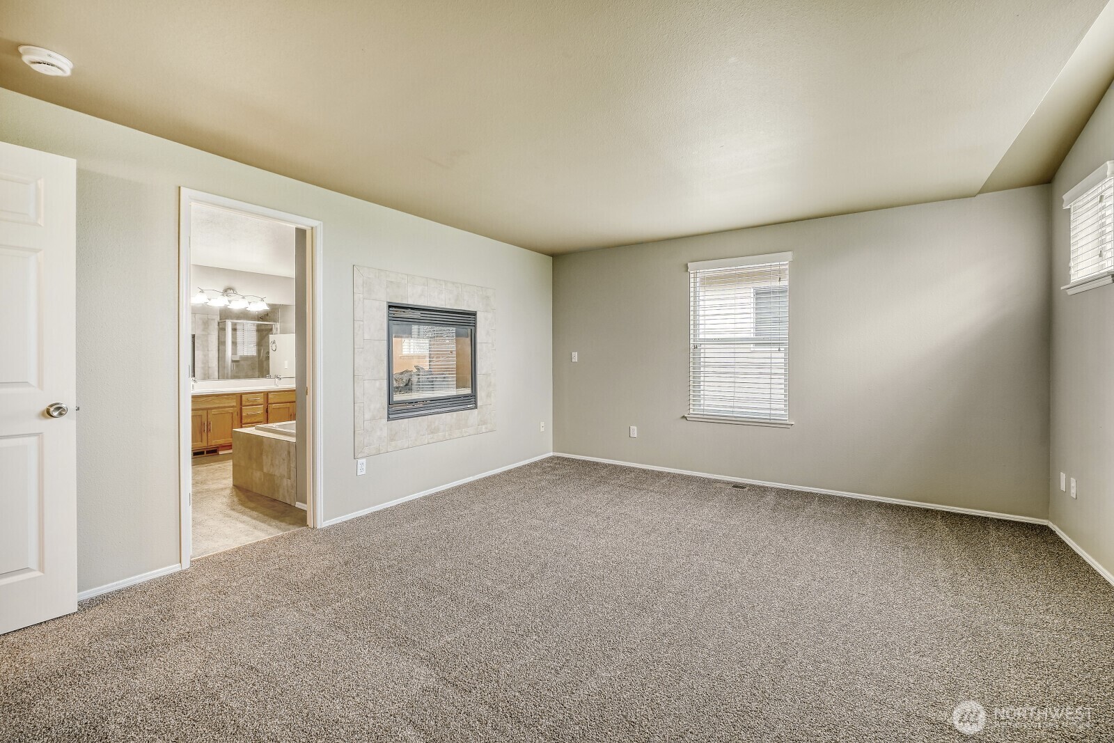 6740 Northeast 1st Place Renton, WA 98059 - Photo 15 of 21 an empty room with windows