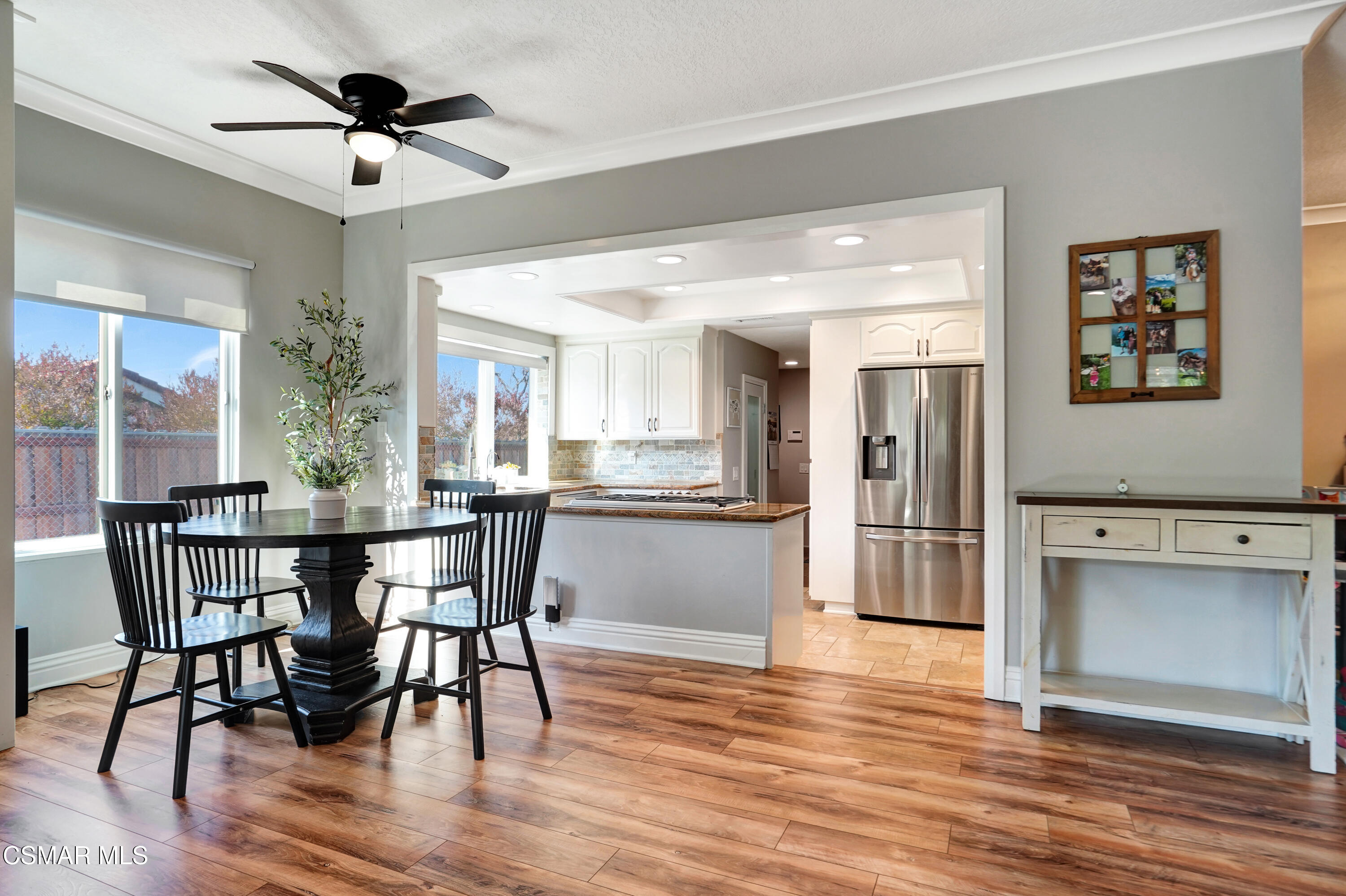 160 Wrangler Road Simi Valley, CA 93065 - Photo 15 of 65 a view of a dining room with furniture and wooden floor