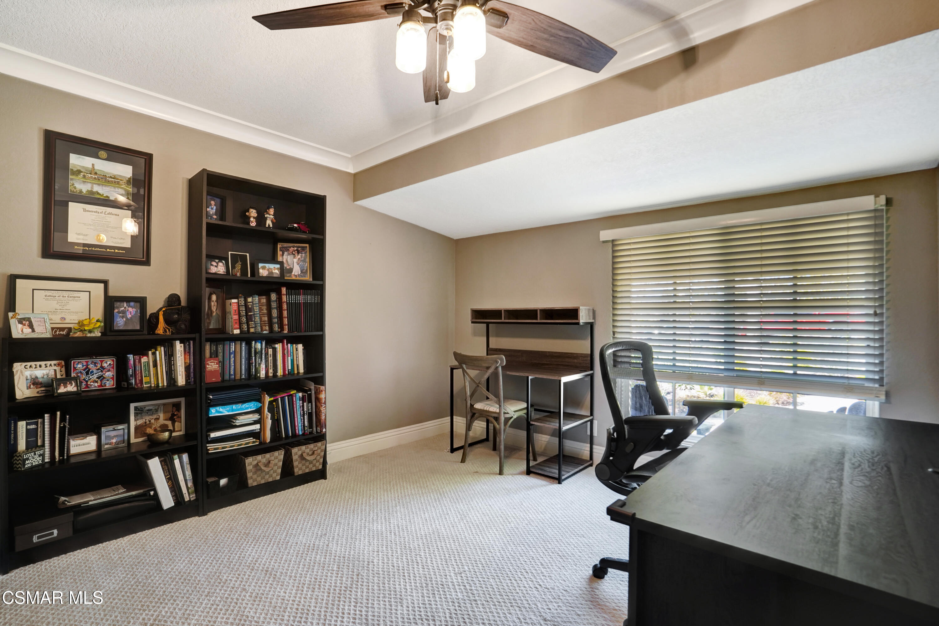 160 Wrangler Road Simi Valley, CA 93065 - Photo 27 of 65 a view of a workspace with furniture and a bookshelf