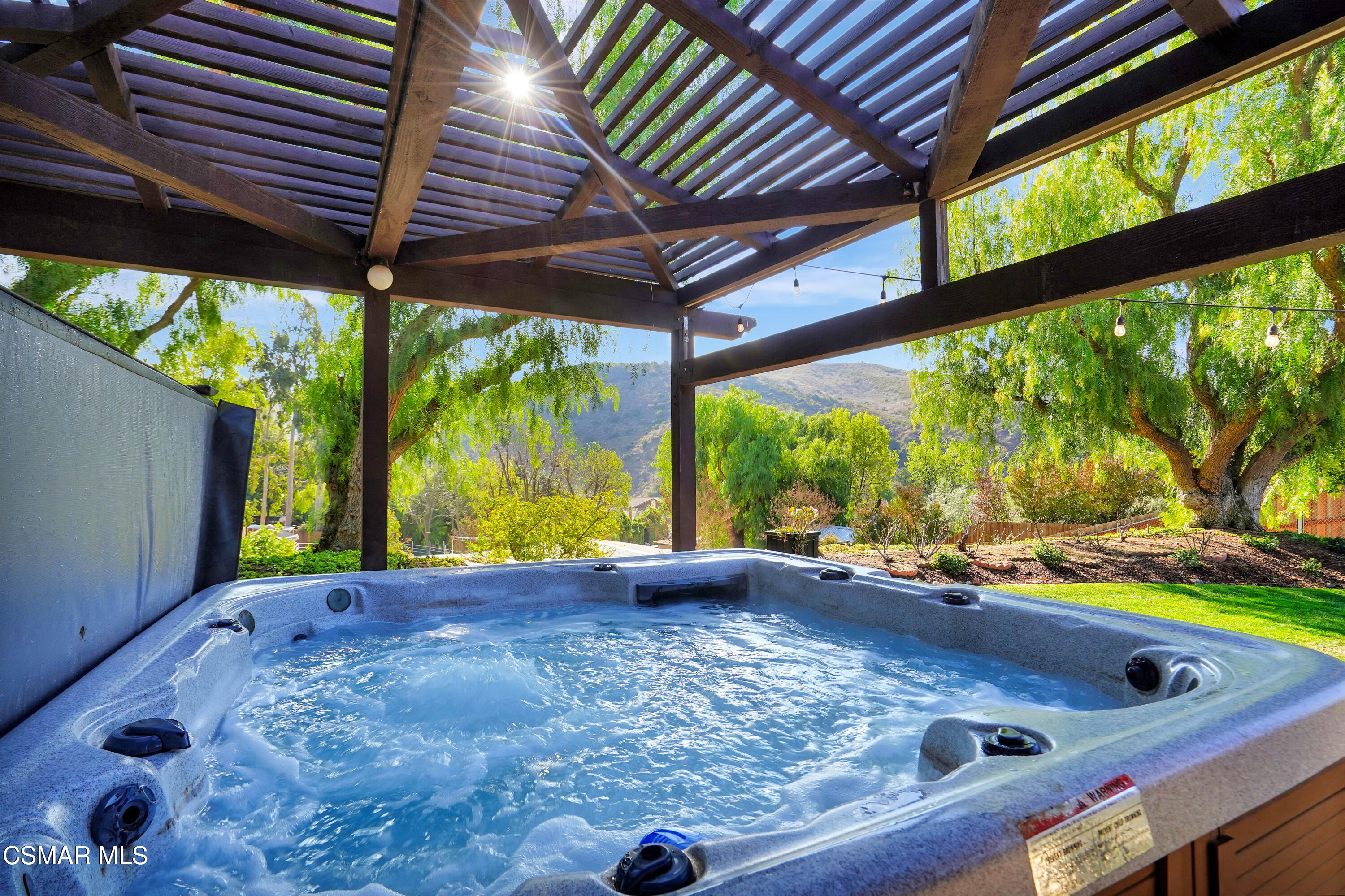 160 Wrangler Road Simi Valley, CA 93065 - Photo 40 of 65 a view of a backyard with a small cabin