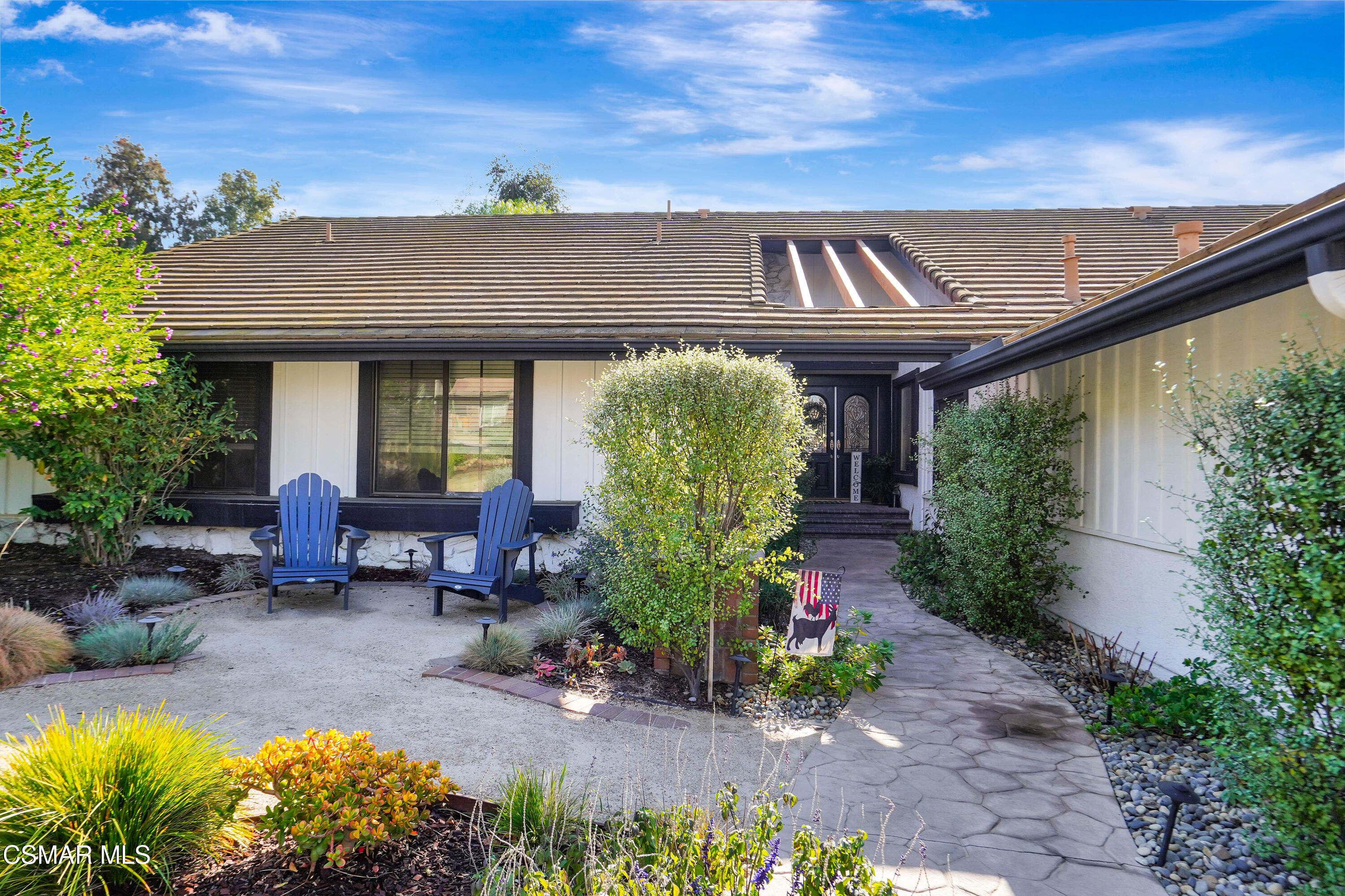 160 Wrangler Road Simi Valley, CA 93065 - Photo 4 of 65 a view of a chairs and table in the patio