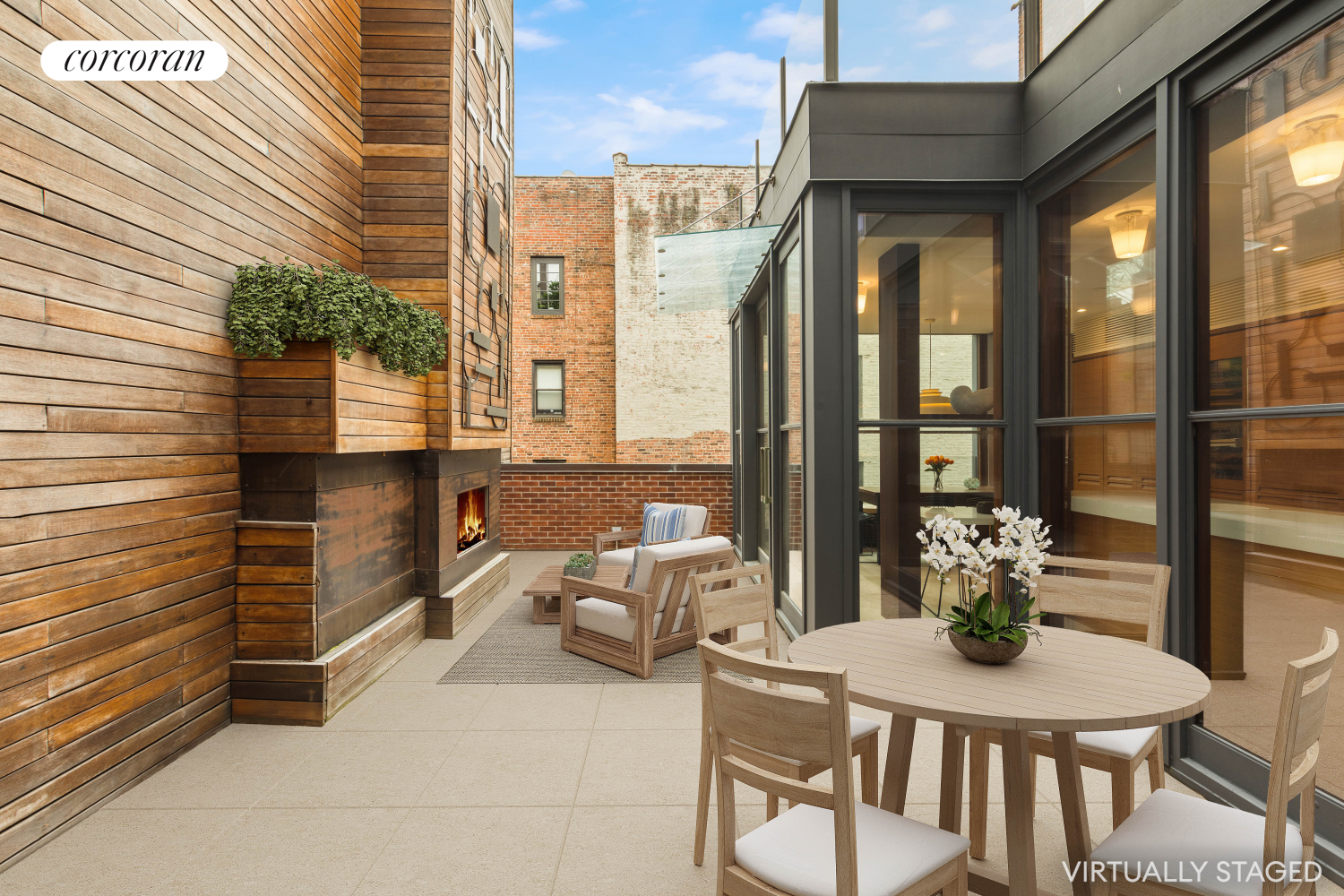 22 Gramercy Park South, Unit PH Manhattan, NY 10003 - Photo 9 of 25 a view of a patio with a table and chairs and potted plants