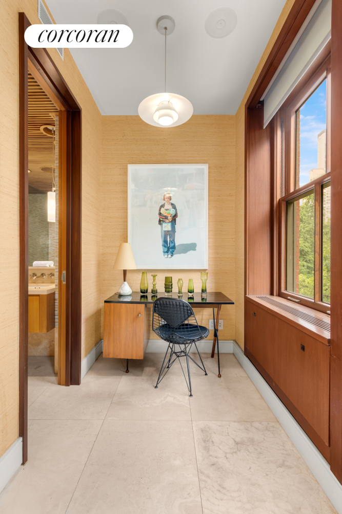 22 Gramercy Park South, Unit PH Manhattan, NY 10003 - Photo 12 of 25 a living room with furniture and a large window