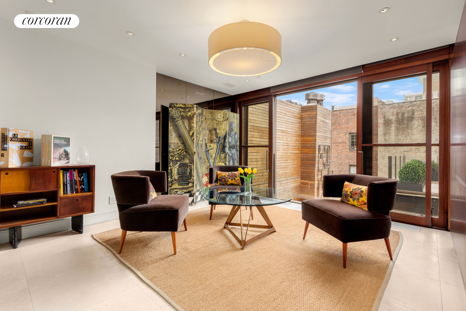 22 Gramercy Park South, Unit PH Manhattan, NY 10003 - Photo 4 of 25 a living room with furniture and a large window