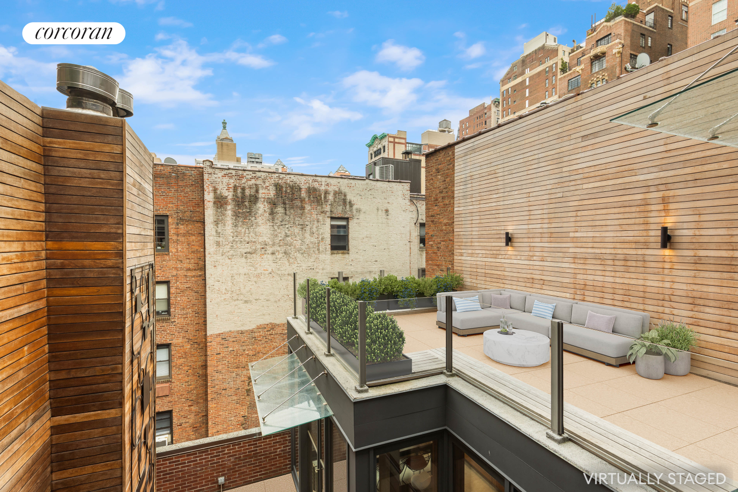 22 Gramercy Park South, Unit PH Manhattan, NY 10003 - Photo 5 of 25 a view of balcony with a couple of couches and potted plants