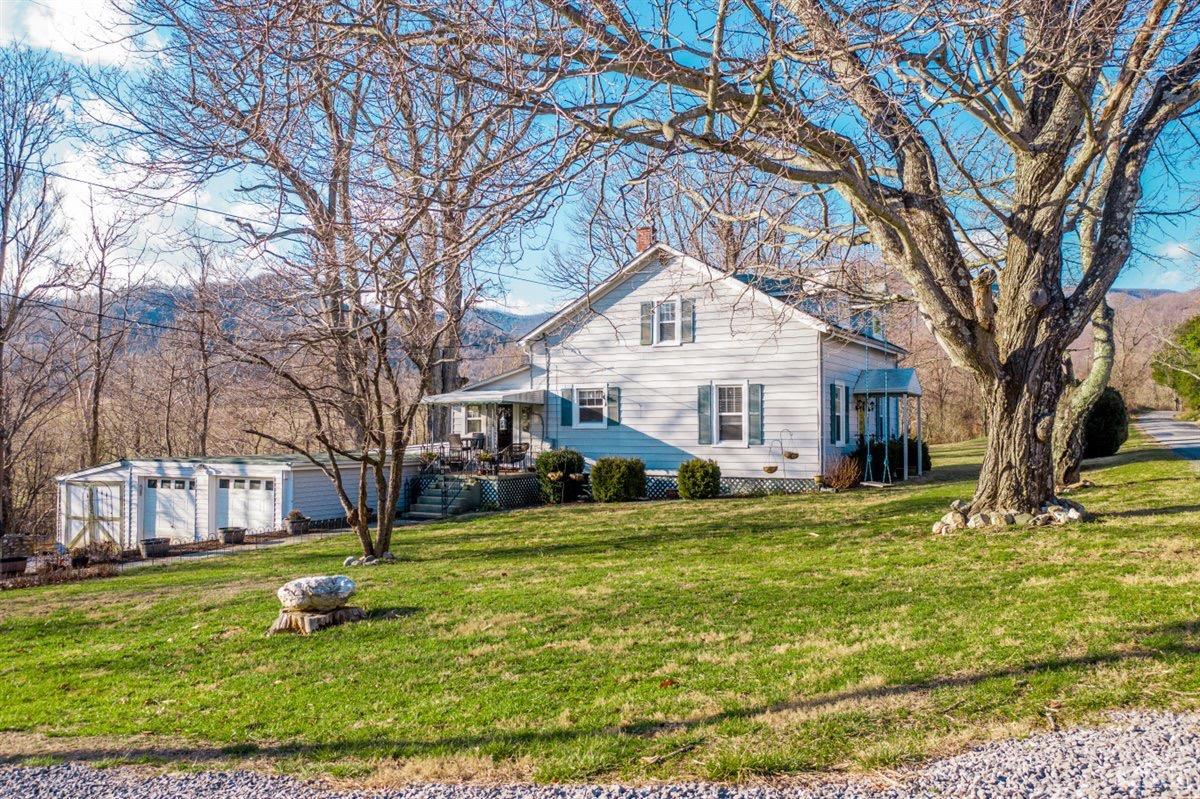 1045 Thrashers Creek Road Amherst, VA 24521 - Photo 2 of 54 a view of a house with a yard