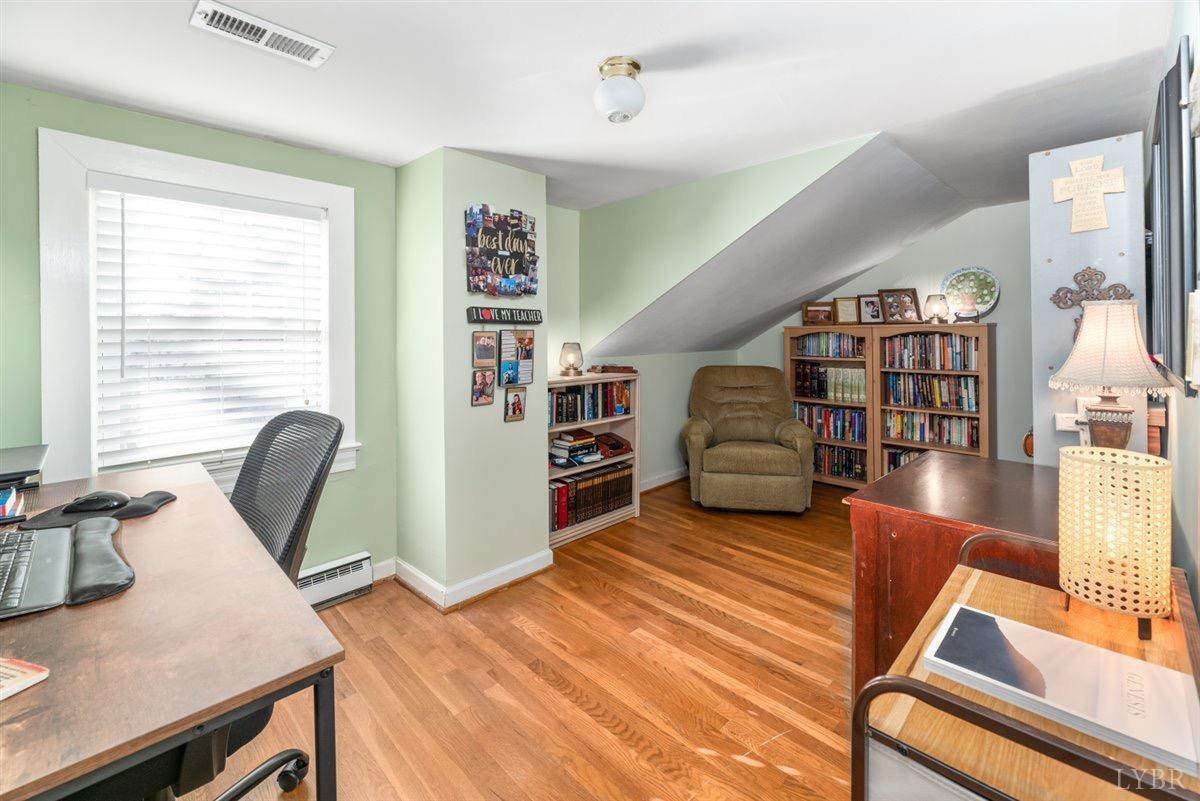 1045 Thrashers Creek Road Amherst, VA 24521 - Photo 25 of 54 a workspace with furniture hardwood and a window