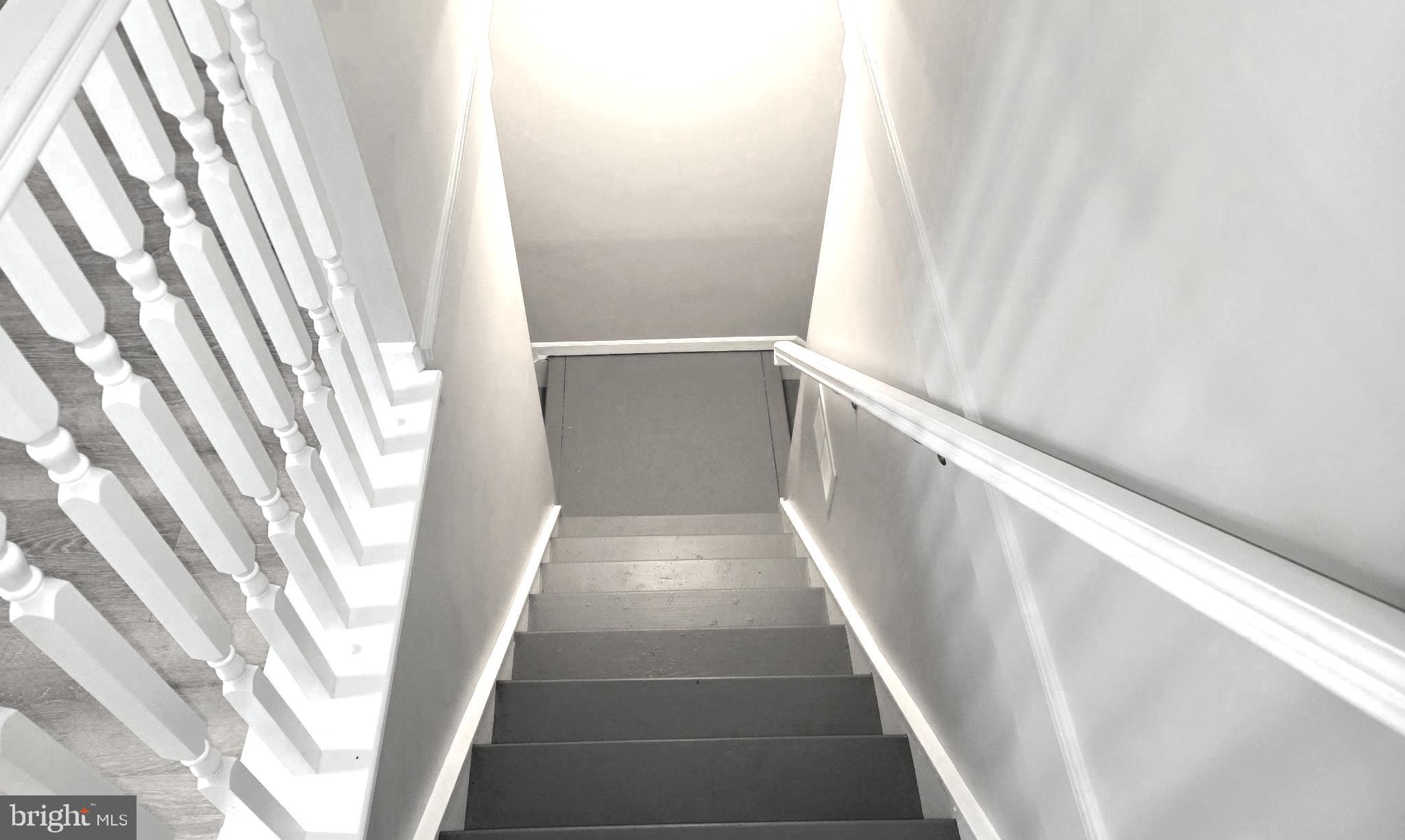 1226 East Chase Street Baltimore, MD 21202 - Photo 11 of 41 Stair view leading to lower level